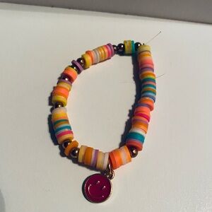 Colorful Beaded Bracelet with Smiley Charm
